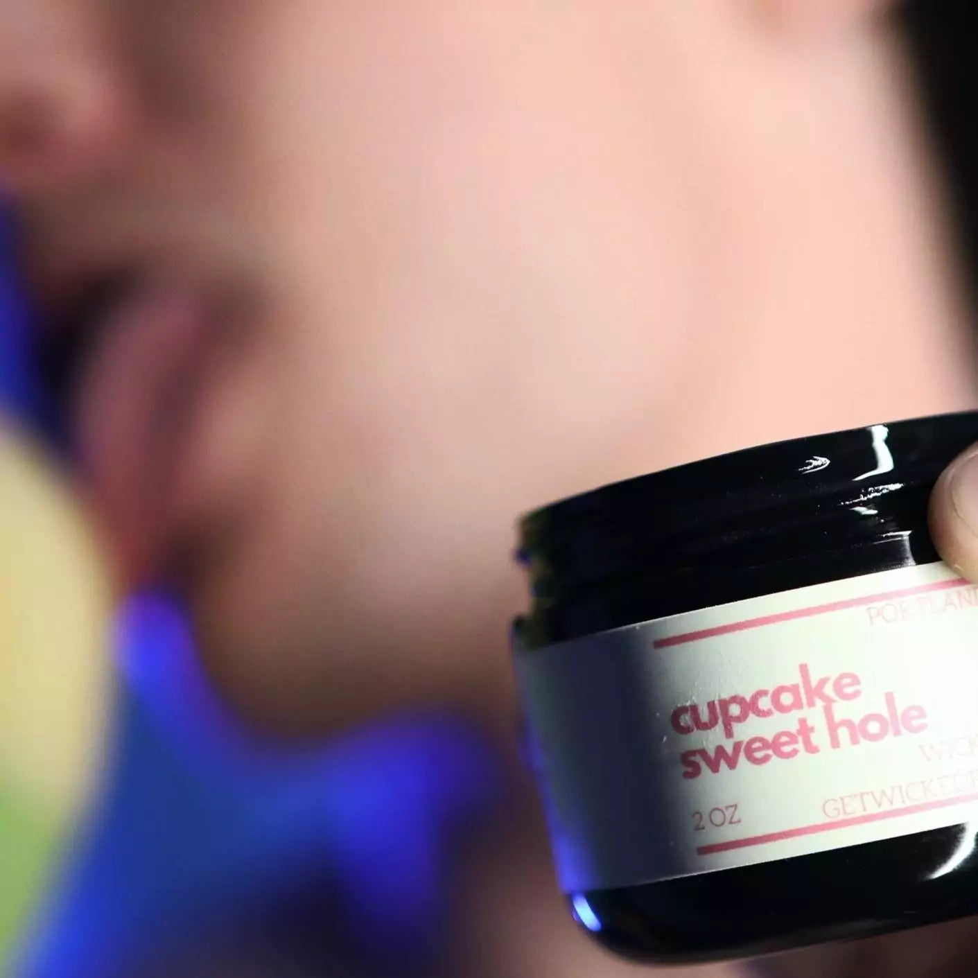 Edward Terrant gay porn star is in the background licking himself when holding a jar of cupcake sweet hole by wicked fox. this product is made in portland oregon and has organic ingredients. 