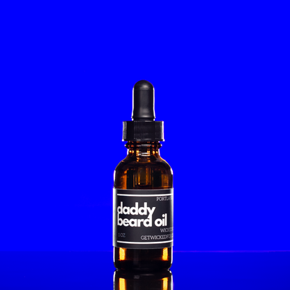 Wicked Fox's Daddy Beard Oil in a sleek bottle. Perfect for gay men seeking quality beard care online. Infused with a seductive leather scent, it's a favorite in the BDSM community. This beard oil not only reduces ingrown hairs but also imparts a sexy smell for irresistible facial hair.