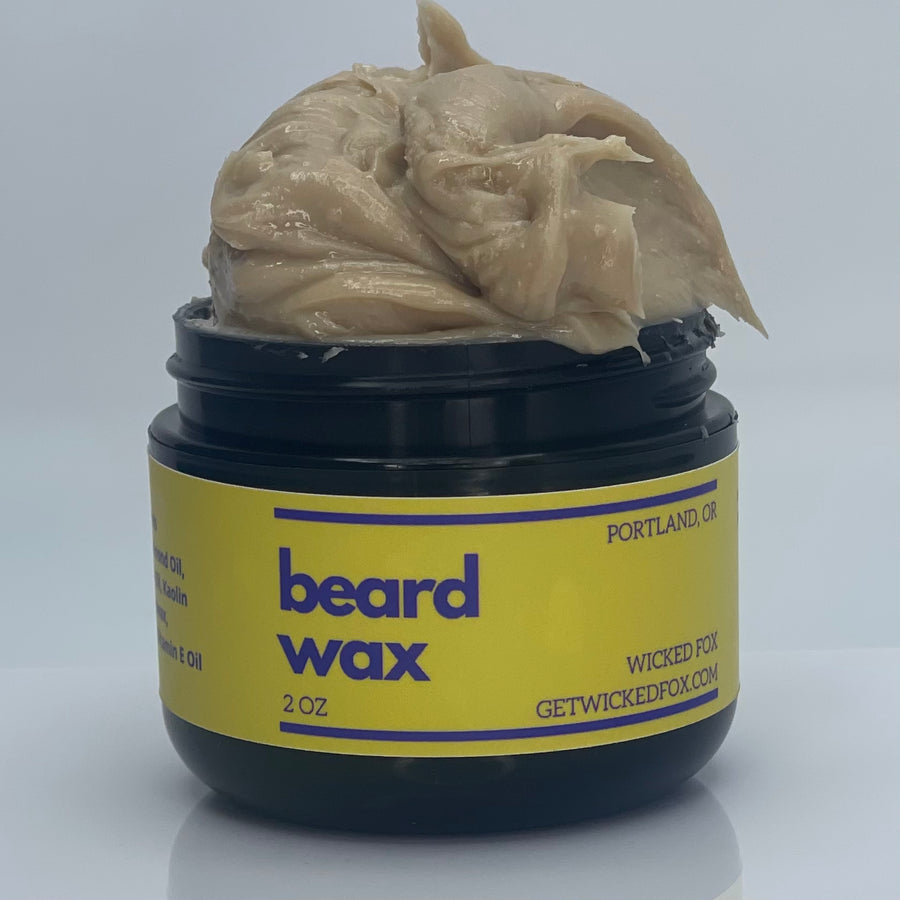 Organic Wicked Fox Beard Wax in stylish container, ideal for styling and nourishing facial hair. Perfect beard care product for gay men prioritizing all-natural ingredients like jojoba oil and beeswax.
