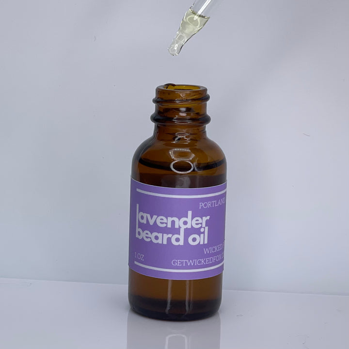 Wicked Fox's Lavender Beard Oil, a premium beard care product specifically designed for gay men. This oil reduces ingrown hairs, softens facial hair, and leaves a sweet lavender scent, making you irresistibly kissable. Ideal for online shoppers seeking high-quality, LGBTQ+ friendly beard products.