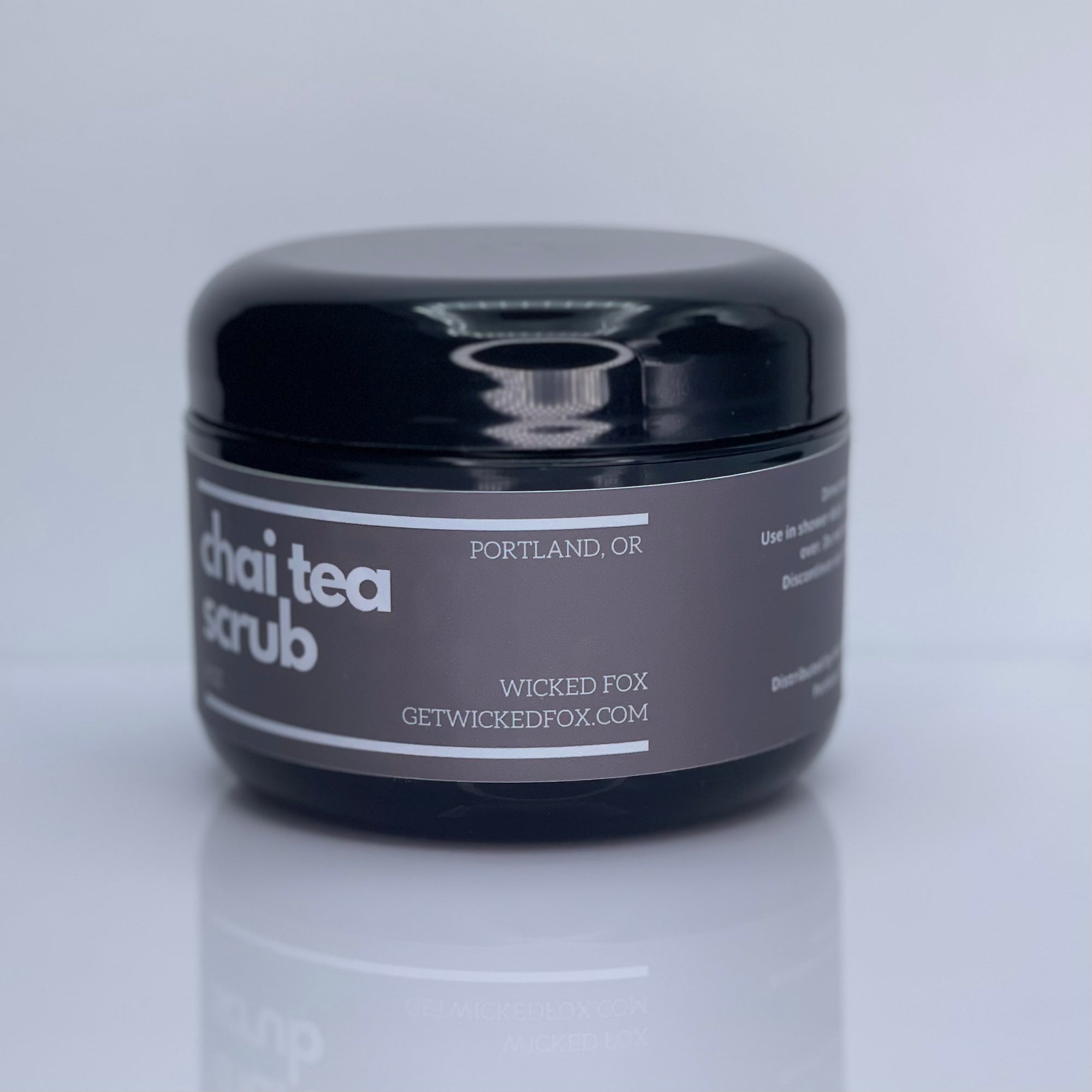 Wicked Fox Chai Tea Scrub, a Portland-made skincare product for gay men. Helps reduce butt acne and stretch marks. Perfect for those interested in jockstraps as well. Indulge in smooth, flawless skin."