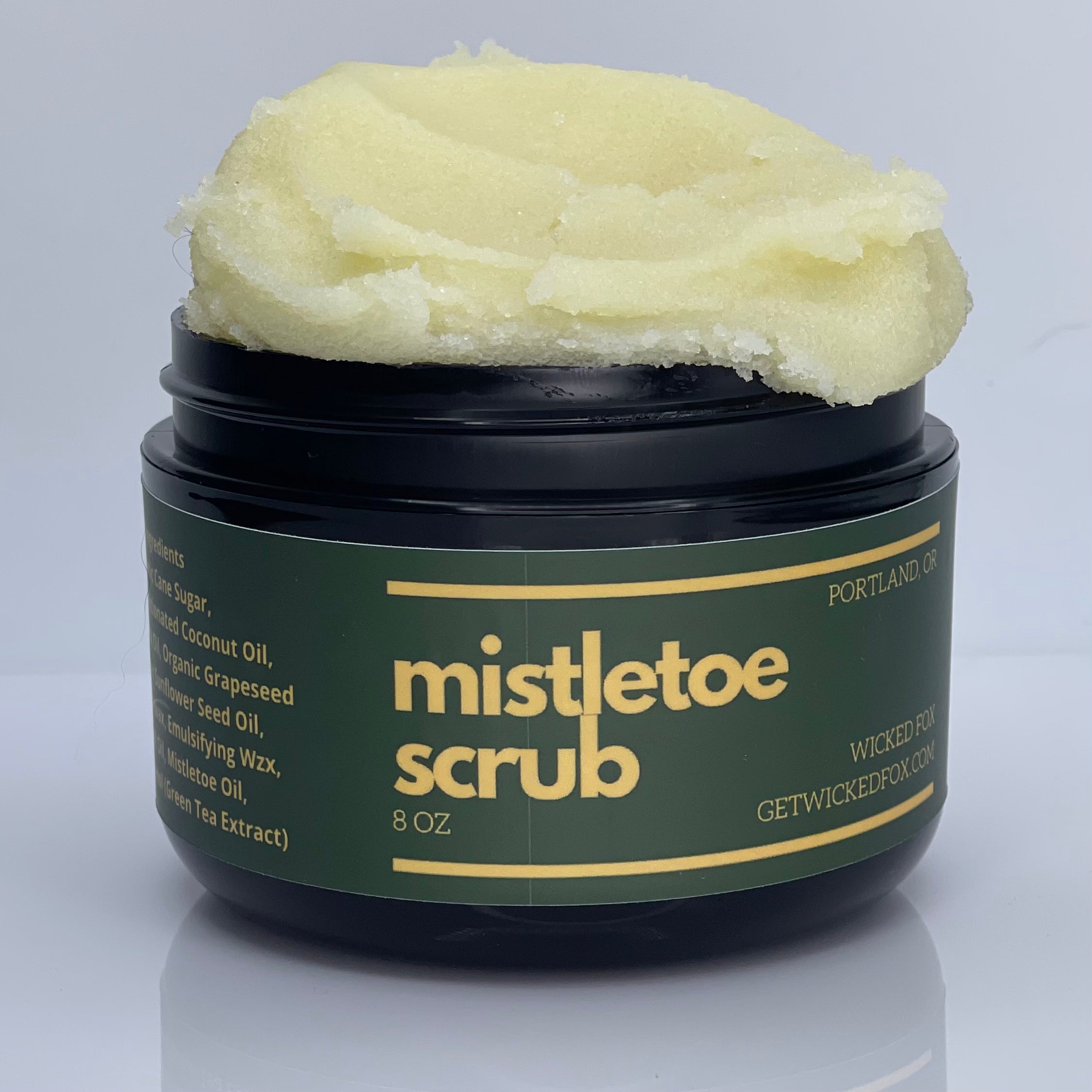 "Get ready to slay the holiday season with Wicked Fox's Mistletoe Scrub! Made in Portland, this sugar scrub is specially designed for gay men looking to reduce butt acne and stretch marks. Enriched with shea butter and cocoa butter, it exfoliates your cheeks and leaves your booty feeling smooth and fabulous. Pair it with our stylish jockstraps for the ultimate confidence boost! ✨🎁 #WickedFox #MistletoeMagic"