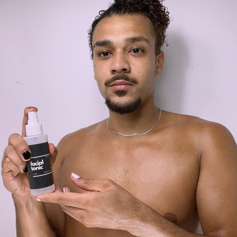 Close-up image of Wicked Fox's Facial Tonic, a skincare spray made in Portland. The bottle has a sleek design with the brand's distinctive fox logo. Ideal for gay queer men seeking to enhance their natural glow and rejuvenate their skin.
