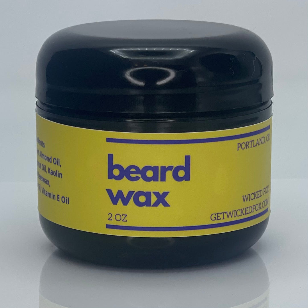 Organic Wicked Fox Beard Wax in stylish container, ideal for styling and nourishing facial hair. Perfect beard care product for gay men prioritizing all-natural ingredients like jojoba oil and beeswax.