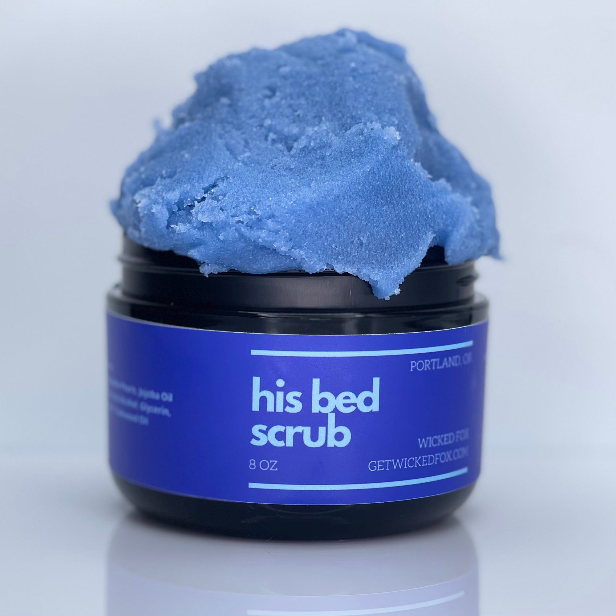 His Bed Body Scrub by Wicked Fox: A luxurious sugar scrub from Portland, Oregon. Infused with the irresistible scent of teakwood, this scrub exudes masculinity and sensuality. Experience a full-body glow, including your booty cheeks.